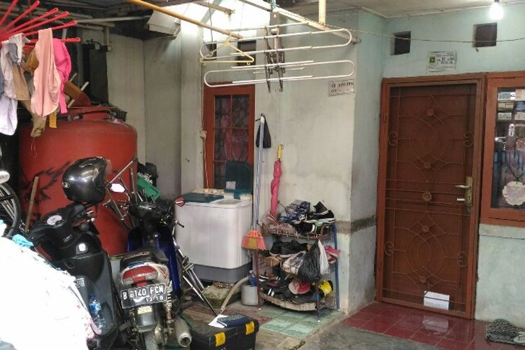 Kondisi rumah Emah (40), yang jadi korban pembunuhan di Perumahan Taman Kota Permai 2, Priuk, Tangerang, Selasa (13/2/2018).