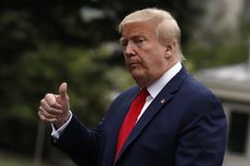 Trump Sudah Pakai Masker, tapi Tidak Mau Difoto