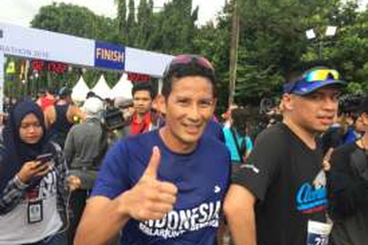 Bakal calon wakil gubernur DKI Jakarta, Sandiaga Uno di Jakarta Marathon 2016, Monas, Jakarta Pusat, Minggu (23/10/2016).
