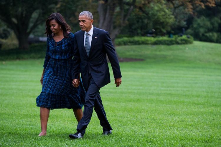 Mantan presiden AS Barack Obama dan istrinya Michelle.