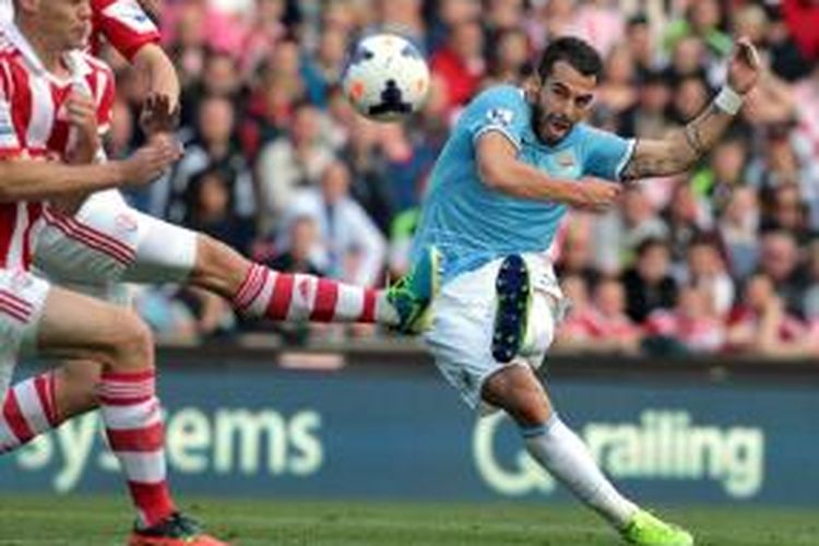 Penampilan penyerang Manchester City, Alvaro Negredo, dalam pertandingan lanjutan Premier League melawan Stoke City, Sabtu (14/9/2013). 