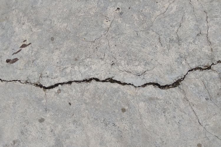 Ilustrasi lantai beton retak.