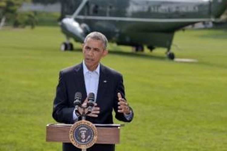 Presiden AS Barack Obama saat memberikan pernyataan di Gedung Putih, Sabtu (9/8/2014) terkait krisis di Irak.