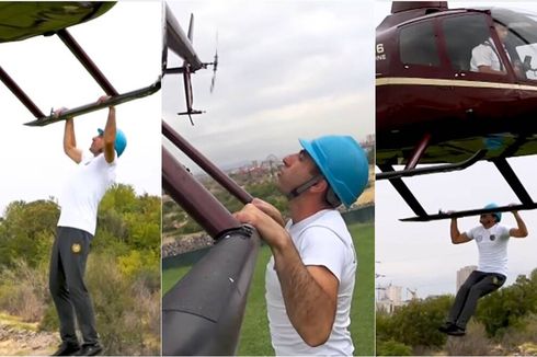 Roman Pull-Up di Helikopter Terbang demi Cetak Rekor Dunia