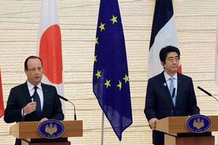 Presiden Perancis Francois Hollande dalam jumpa pers bersama PM Shinzo Abe di Tokyo, Jumat (7/6/2013).