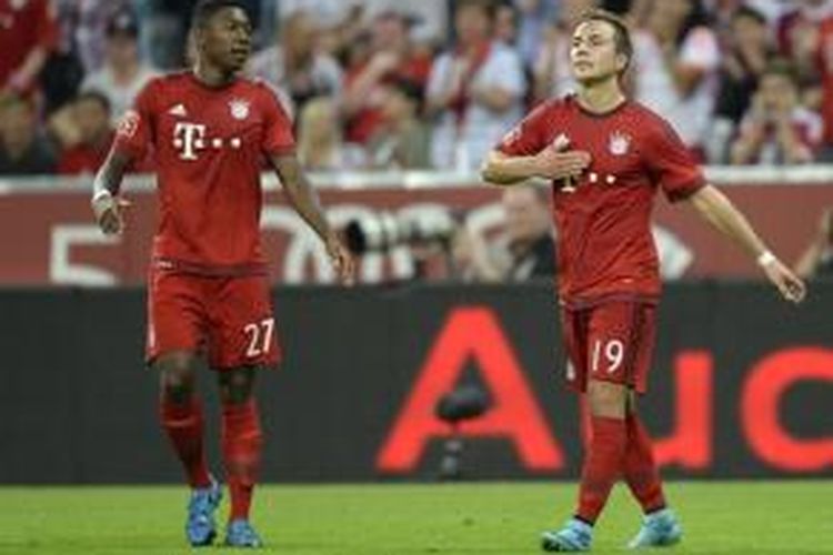 Mario Goetze (kanan) merayakan gol kedua Bayern Muenchen ke gawang AC Milan pada ajang Audi Cup, Selasa waktu setempat atau Rabu (5/8/2015) WIB. 
