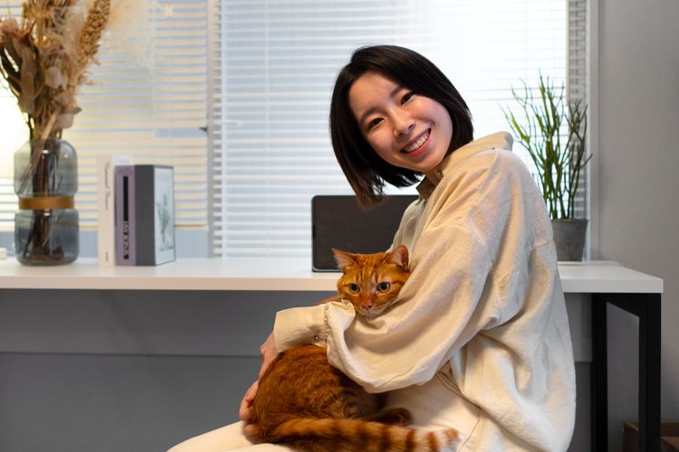Mengapa kucing suka duduk di pangkuan pemiliknya?