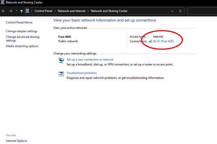 Opsi Wifi Settings pada menu pengaturan Network and Sharing Center.