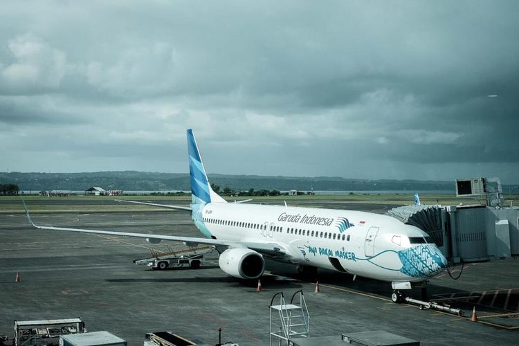An image of Indonesia's national flag carrier Garuda Indonesia at Bali airport. As Indonesia will tighten social restrictions in some areas, overseas tourists can only arrive through Jakarta and Bali airports, as well as via Batam and Tanjung Pinang in the Riau Islands near Singapore. 