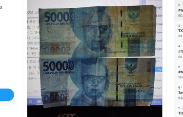 Tangkapan layar twit soal uang rupiah asli dan palsu