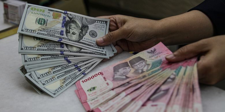 ilustrasi rupiah dollar AS, dolar hari ini. Dolar ke rupiah. Dollar ke rupiah. Rupiah ke dollar. 1 dolar berapa rupiah hari ini.