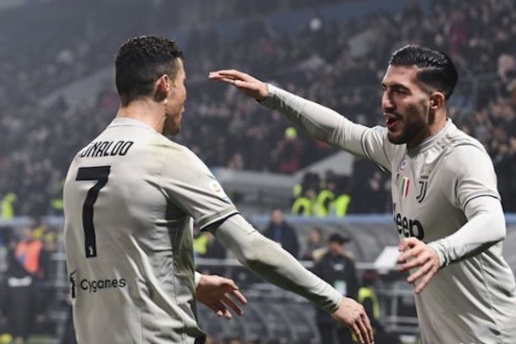Cristiano Ronalo dan Emre Can merayakan gol pada laga Sassuolo vs Juventus dalam lanjutan Serie A Liga Italia di Stadion Mapei, 10 Februari 2019. 