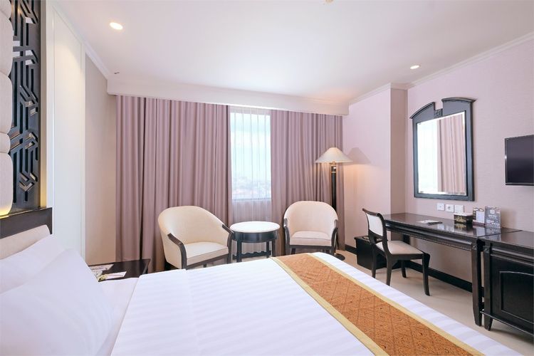 Kamar tipe Deluxe di Grand Arkenso Parkview Hotel, salah satu hotel di Semarang dekat Simpang Lima.