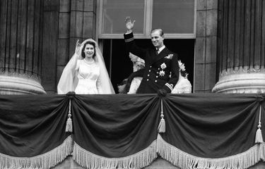 The bride, Princess Elizabeth and groom, the newly created Duke of Edinburgh on the balcony of Buckingham Palace after they were married in a ceremony at Westminster Abbey.