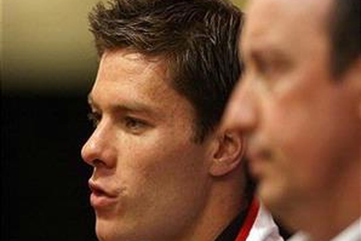 Xabi Alonso dan pelatih Liverpool, Rafael Benitez.