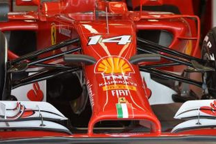 Mobil pebalap Ferrari asal Spanyol, Fernando Alonso, berada di garasi jelang GP Australia di Melbourne, Kamis (13/3/2014).