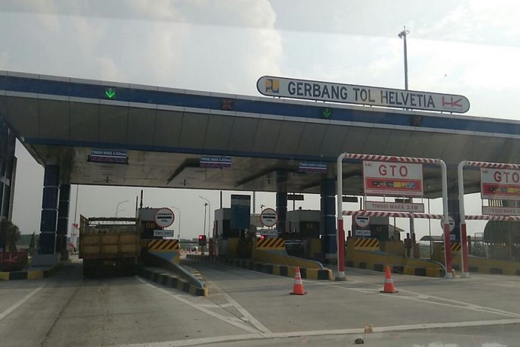 Gerbang Tol (GT) Helvetia yang merupakan bagian dari ruas tol Binjai-Medan, saat dilintasi pada Kamis (14/6/2018).