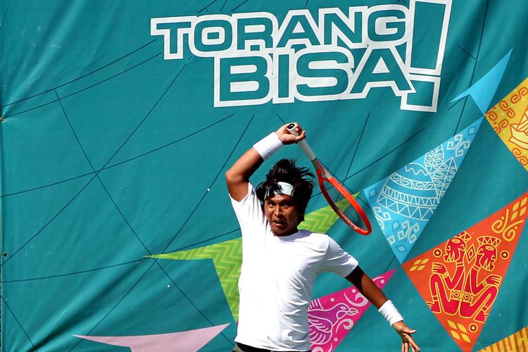 Atlet tenis lapangan Jawa Timur, Christopher Rungkat saat mengikuti PON XX Papua 2021 di Lapangan Tenis Sian Soor Walikota, Kota Jayapura, Minggu (3/10/2021) sore.