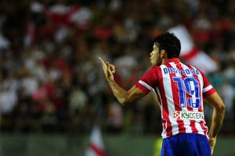 Atletico Madrid's Brazilian forward Diego da Silva Costa reacts to play during the Spanish league football match Sevilla FC vs Club Atletico de Madrid at the Ramon Sanchez Pizjuan stadium in Sevilla on August 18, 2013. ...