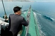 Media Korut Rilis Foto Kim Jong Un Naik Kapal Selam