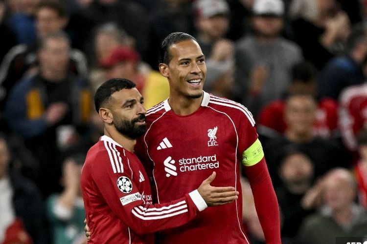 Mohamed Salah dan Virgil van Dijk merayakan gol bagi Liverpool. Duel Liverpool vs Atletico Madrid digelar di Stadion Anfield, Kamis (18/9/2025) dini hari WIB berakhir dengan skor 3-2 untuk kemenangan The Reds.