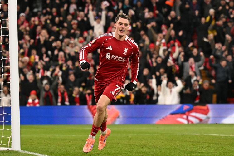 Gelandang serang Liverpool, Florian Wirtz, merayakan gol pertamanya di Premier League pada partai Liverpool vs Wolves bergulir di Stadion Anfield pada Sabtu (27/12/2025).