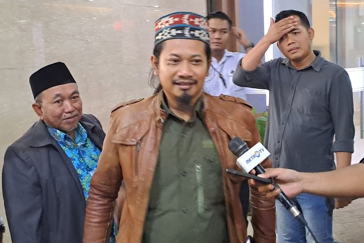 Pendiri NII Crisis Center Ken Setiawan saat mendatangi Gedung Bareskrim Polri, Jakarta Selatan, Selasa (27/6/2023). 