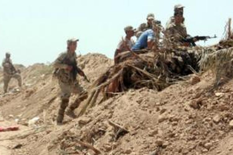 Warga Irak ikut membantu tentara pemerintah melawan Daulah Islamiyah.