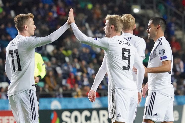 Timo Werner merayakan golnya pada laga Estonia vs Jerman dalam kualifikasi Euro 2020 di A Le Coq Arena, Talinn 13 Oktober 2019, bersama Marco Reus dan Ilkay Guendogan. 