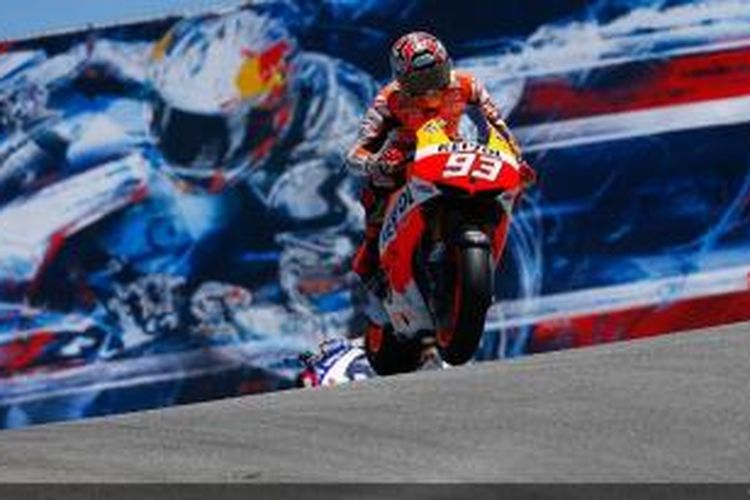 Pebalap Repsol Honda, Marc Marquez, memacu motornya pada sesi kualifikasi GP Amerika Serikat di Sirkuit Laguna Seca, Sabtu (20/7/2013).