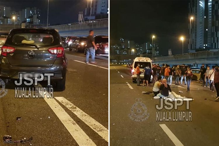 TKP kecelakaan lalu lintas di Maju Expressway (MEX) Malaysia, yang menewaskan perempuan berusia 43 tahun saat menolong korban tabrakan mobil.
