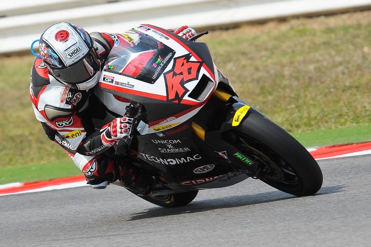 Japanese rider Shoya Tomizawa of team Technomag-CIP (R) rides during the San Marino Moto2 Grand Prix motorcycling race at the Santa Monica, Misano Adriatico track on September 5, 2010 before fatally crashing. The 19-year-old rider came off his Suter bike when under pressure from the fast charging Italian Alex de Angelis. Neither de Angelis nor British rider Scott Redding were able to avoid hitting Tomizawa, who was propelled over 40 metres and off the track into the gravel. The rider was treated initially at the site, but was taken to hospital and later pronounced dead. According to race organisers, Tomizawa suffered serious injuries to his skull, chest and abdomen.   AFP PHOTO / ANDREAS SOLARO (Photo by ANDREAS SOLARO / AFP)