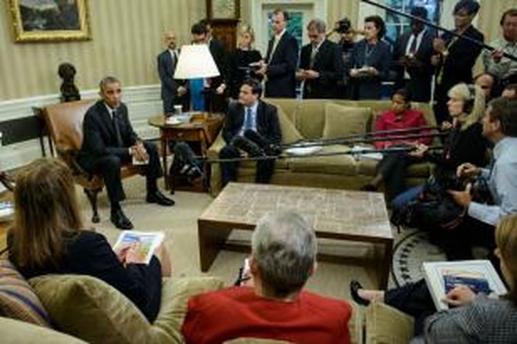 Presiden AS Barack Obama memberikan jumpa pers di ruang kerjanya di Gedung Putih, Rabu (22/10/2014) malam waktu setempat, terkait insiden penembakan di Gedung Parlemen Kanada.