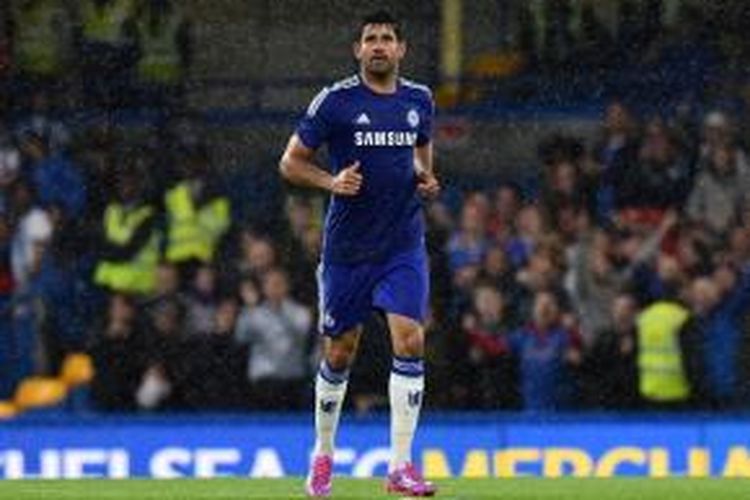 Striker Chelsea, Diego Costa, seusai mencetak gol keduanya ke gawang Real Sociedad pada pertandingan uji coba pramusim di Stadion Stamford Bridge, Selasa (12/8/2014) dini hari WIB. Chelsea menang 2-0 pada pertandingan tersebut.