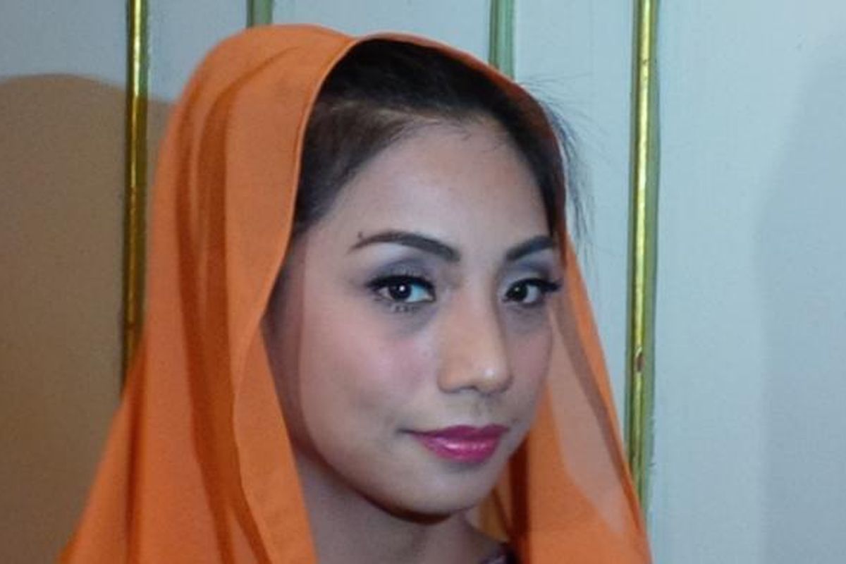 Penyanyi dangdut Siti Rahmawati alias Siti 'KDI' berfoto di Hotel Kartika Chandra, Jakarta Selatan, Minggu (20/9/2015).