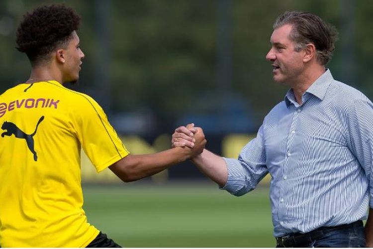Mantan direktur olahraga Borussia Dortmund, Michael Zorc, bersama Jadon Sancho. Zorc kini dikaitkan dengan posisi direktur teknis timnas Indonesia.