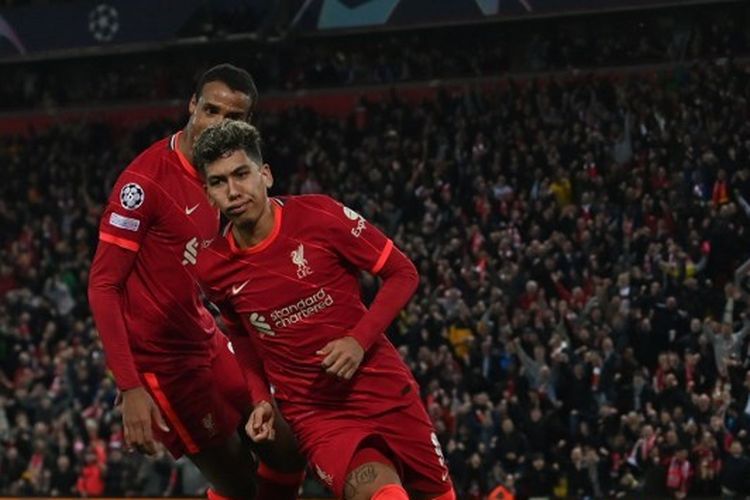 Roberto Firmino merayakan gol yang ia cetak dalam laga Liverpool vs Benfica pada leg kedua perempat final Liga Champions Eropa yang digelar di Stadion Anfield pada Kamis (14/4/2022) dini hari WIB.