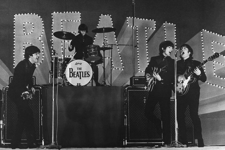 This photo taken on June 30, 1966 shows British band The Beatles, (L to R) Paul McCartney, Ringo Starr, George Harrison and John Lennon, performing during their concert at the Budokan in Tokyo. - A group of Japanese Beatles fans on October 30, 2018 have lost their bid to get police to hand over historic footage of the band's legendary 1966 Japan visit. (Photo by JIJI PRESS / JIJI PRESS / AFP) / Japan OUT