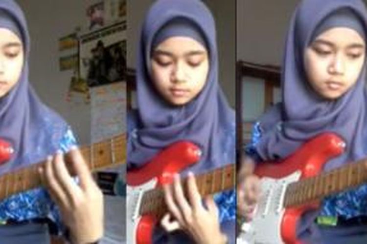 Gadis berhijab menghebohkan pengguna media sosial dengan kepiawaiannya memainkan gitar teknik.
