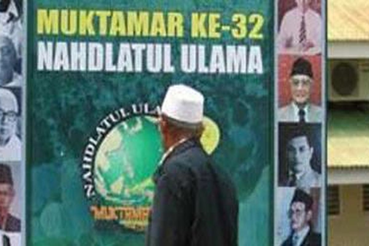 Baliho Muktamar ke-32 Nahdlatul Ulama (NU) di arena Makassar, Sulawesi Selatan.  