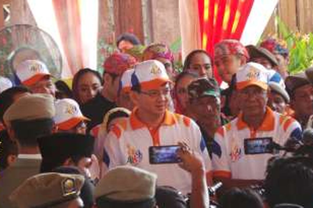Gubernur DKI Jakarta Basuki Tjahaja Purnama saat menghadiri pencanangan HUT ke-489 DKI Jakarta, di Setu Babakan, Jakarta Selatan, Sabtu (28/5/2016).