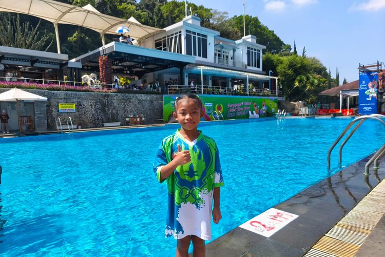 Alika Naila Putri, bocah 9 tahun asal Kota Batu menyabet medali emas loncat indah di ajang Porprov Jatim IX.