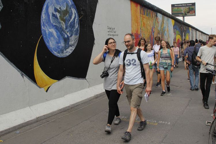 Tembok Berlin, Rabu (20/6/2018), merupakan salah satu destinasi wisata yang wajib didatangi turis di kota Berlin, Jerman.