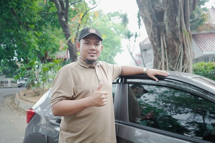 Fajar Shiddiq (27), salah satu mitra pengemudi GrabCar di Kota Bandung.