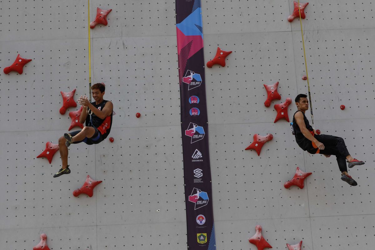 Two Indonesian climbers, Veddriq Leonardo (right) and Kiromal Katibin (left) during the 2019 Asian Championship in Bogor, West Java on Saturday, November 9, 2019.  