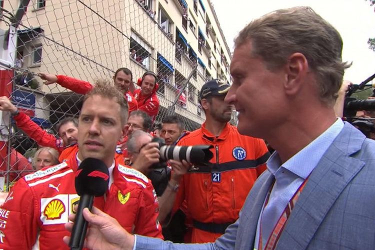 Sebastian Vettel sedang memberikan komentarnya atas hasil yang ia raih pada GP Monaco 2018, Minggu (27/5/2018).
