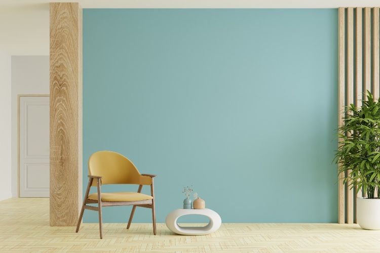Ruang tamu di rumah minimalis dengan cat dinding berwarna hijau pastel