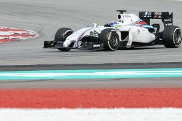 Pebalap Williams asal Brasil Felipe Massa menikung di Sirkuit Sepang pada GP Malaysia, Minggu (30/3/2014).