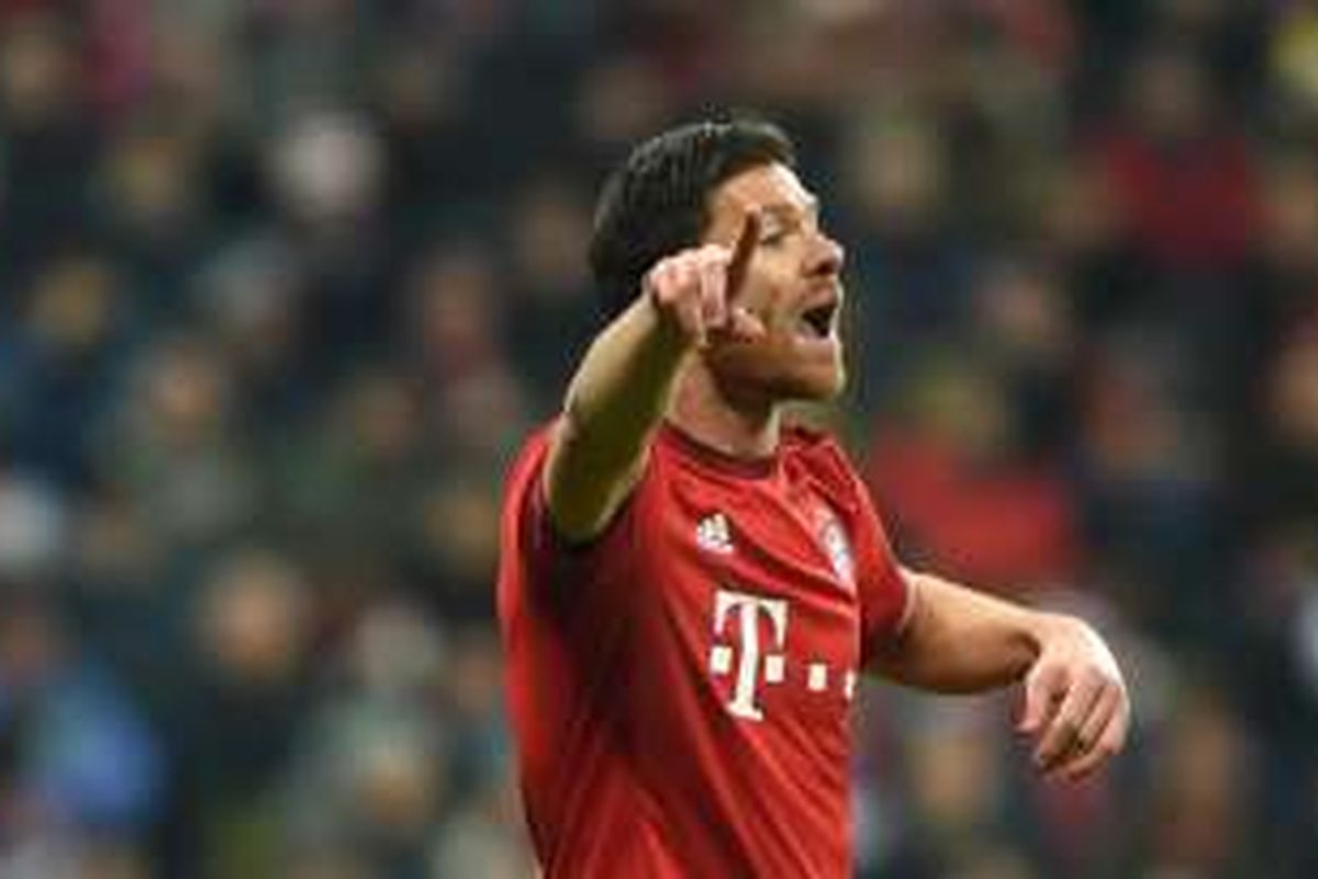 Ekspresi gelandang Bayern Muenchen, Xabi Alonso, saat melawan Juventus pada perempat final kedua Liga Champions di Stadion Allianz Arena, 16 Maret 2016.