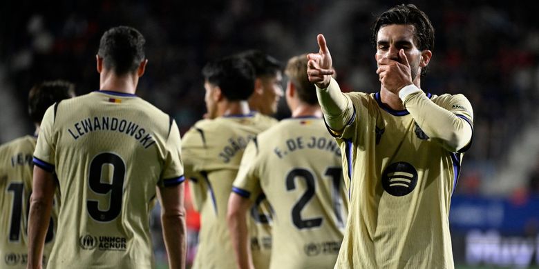 Ferran Torres merayakan gol kedua timnya dalam pertandingan sepak bola Liga Spanyol antara CA Osasuna vs Barcelona di Stadion El Sadar di Pamplona pada 2 Mei 2026. (Foto oleh ANDER GILLENEA / AFP)